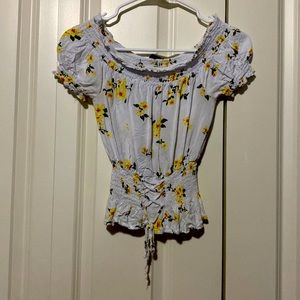 Floral crop top off the shoulders lightly worn